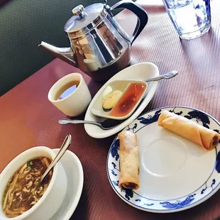 Spring Rolls with fresh made sauces that are delish! Hot &amp; Sour soup to the left &amp; Oolong tea.