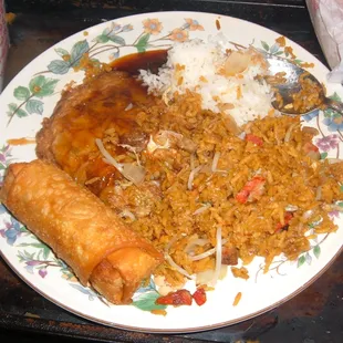 My dinner tonight - note that the Egg Foo Young is mostly hidden by rice as it takes up almost the entire plate.
