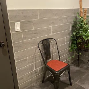 Chair to relax and chill while chatting with people in the bathroom