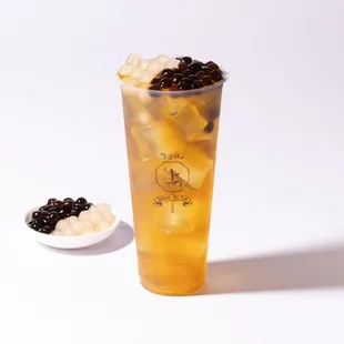 Yinyang Green Tea. Premium Green Tea with boba and signature tapioca cube.