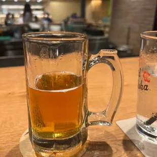 a glass of beer and a glass of water