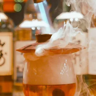 A little twist on the Old Fashion... The smoky flavor compliments the original taste without diluting it, go order one and try~