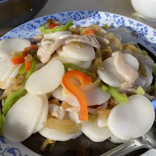 Stir-Fried Rice-Cakes with Shredded Pork and Mustard Greens