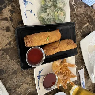 Shrimp and chive dumplings, chicken egg rolls, cream cheese won tons