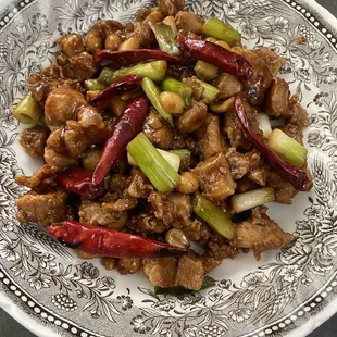 Kung pap chicken , mild spicy and rich flavor .