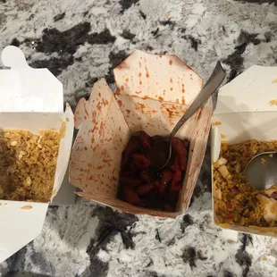 two take out boxes of food