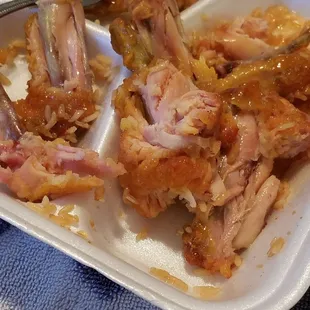 a plate of chicken and rice