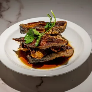 Deep Fried Crispy Fish in Five Spice Sauce Sliced
