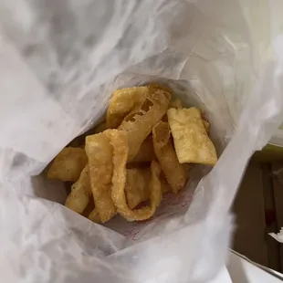 a close up of a bag of fried food