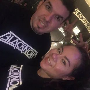 a man and a woman posing for a picture