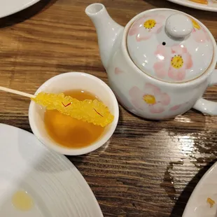 Hot tea with a rock candy swizzle