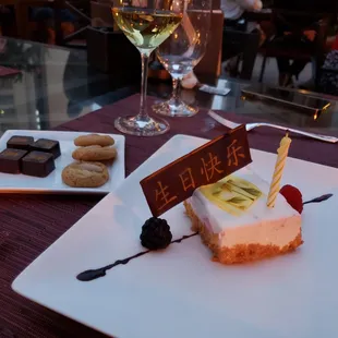 Complimentary birthday dessert, mini-almond cookies and chocolates