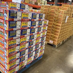 a large stack of pizza boxes