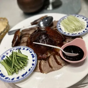 a plate of meat and vegetables