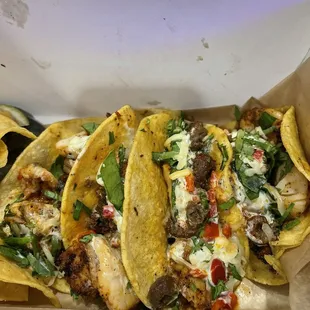 Shrimp tacos and oxtail tacos