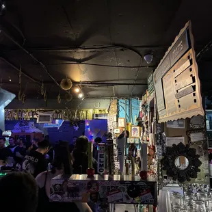 a crowded bar with a lot of people