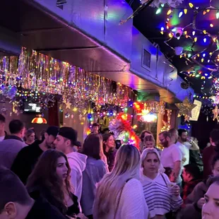 a crowd of people at a party