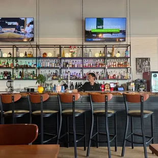 a man sitting at a bar