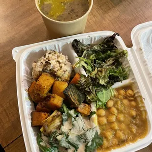Moderate (smaller size) takeout -- mixed bean soup, rice, squash, collard greens, chickpeas, and salad. Very filling