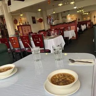 Hot and sour soup and interior tables