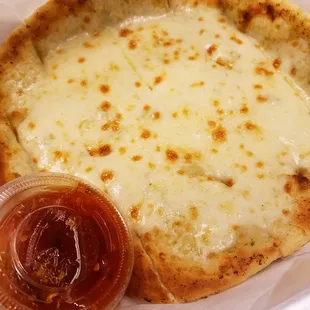 Garlic Cheese Naan (mozzarella) with a fantastic sweet &amp; sour sauce that packs a bit of heat