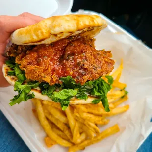 spicy chicken sandwich, extra crispy. The sauce is sweet &amp; spicy, so the heat level is pretty mild/medium but delicious!