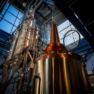 Pot still with columns reaching up to our 50-foot glass tower.