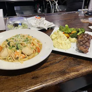 Shrimp and Scallop Scampi and New York Strip Specials. So frieken good!!!