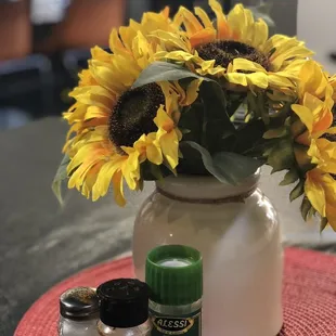 a vase of sunflowers