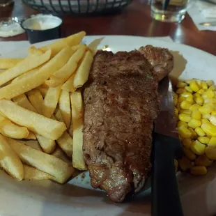 Fries, steak, and corn