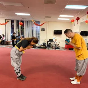 Bowing to Shifu before receiving my green belt