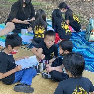 Bonding time while waiting for mom and dad to learn Kung Fu