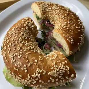 vegetable bagel sandwich with hummus