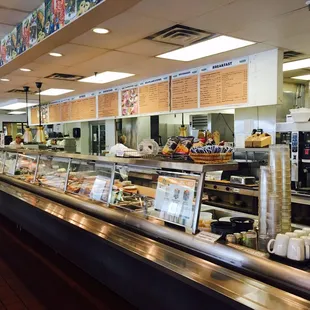 The service counter (note the giant menu)