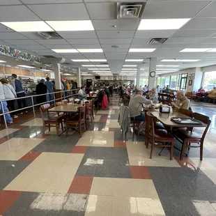people eating in the cafeteria
