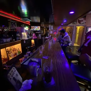 people sitting at the bar