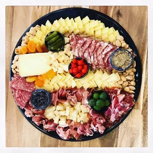 a platter of meat and cheese