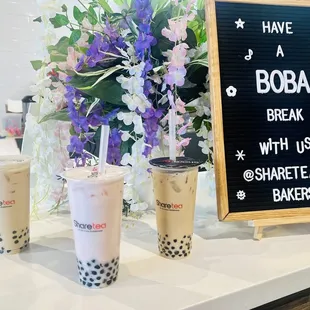 a boba break with two cups of bubble tea