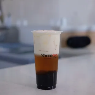 a cup of coffee on a counter