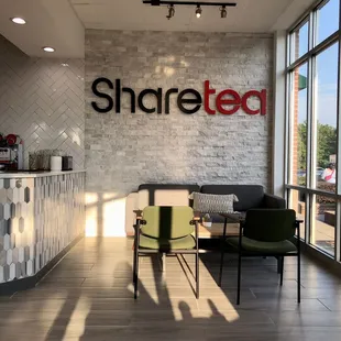 the front desk and lounge area of sharetea