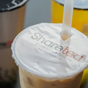 a close up of a drink in a plastic cup