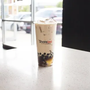 a cup of coffee on a table