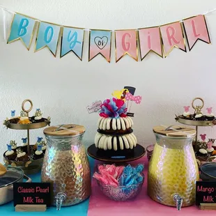 a table with a cake and candy
