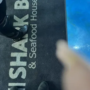 a person standing on a mat