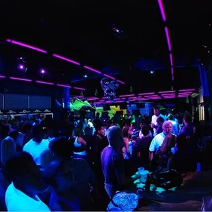 a crowd of people at a party