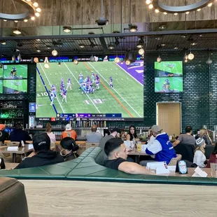 people watching a football game