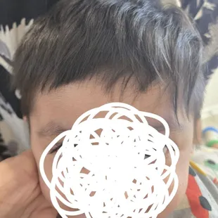 Hair falling on his face