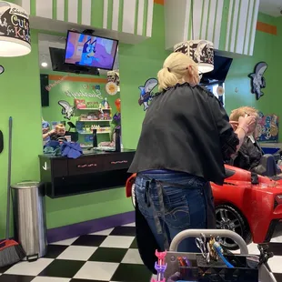 Cool red car seat while watching Bluey.