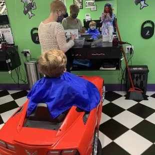 Sitting in a corvette to get a haircut not bad
