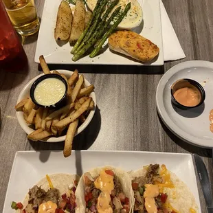 Tacos, Fries with Cheese Dip, Scallop platter